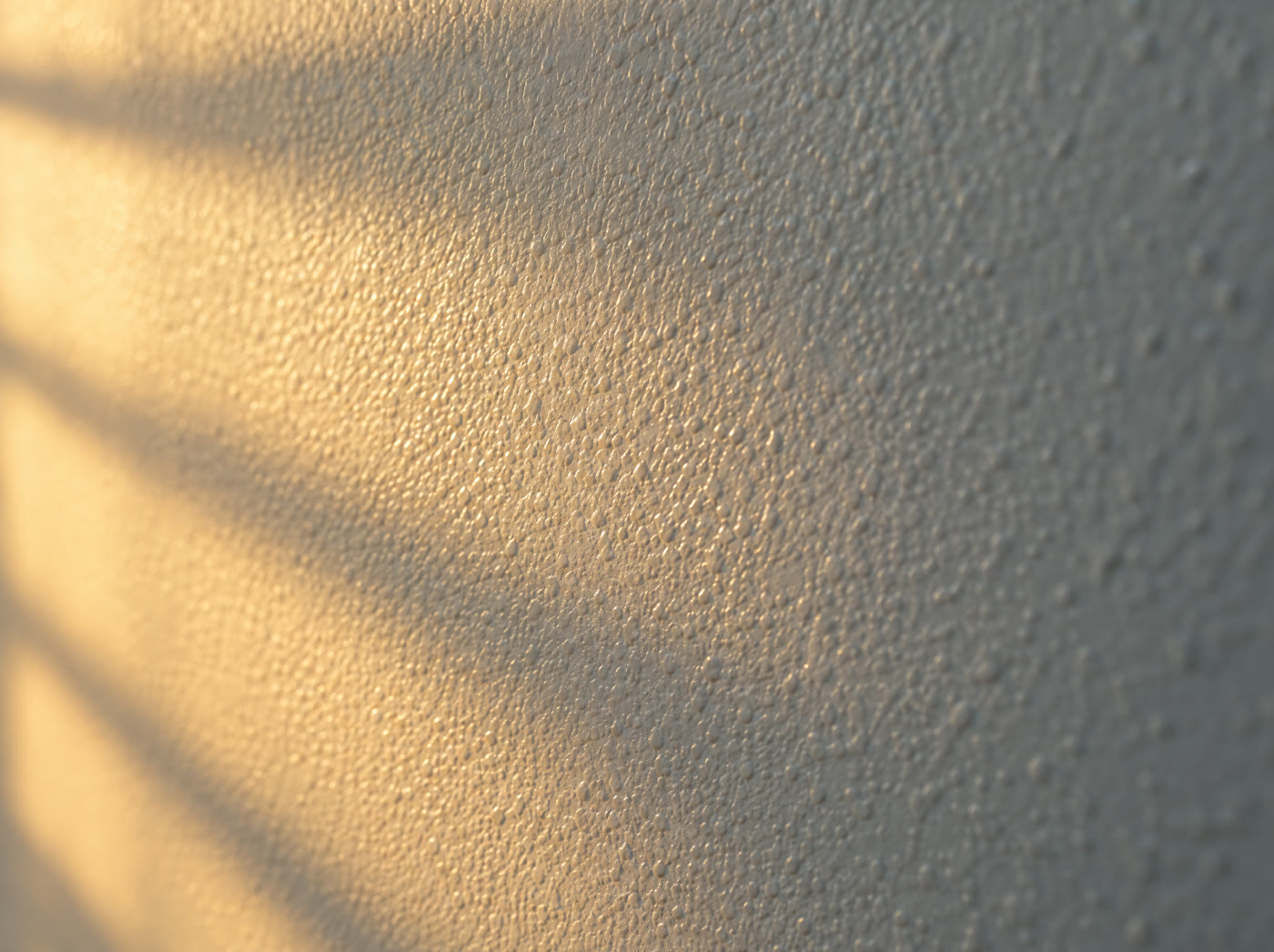 Close-up of orange peel wall texture